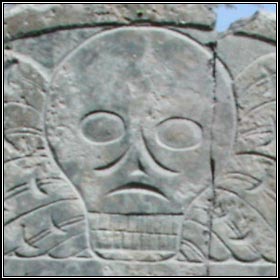 Winged death's head on headstone for Mrs. Elizabeth Stanly (1771).