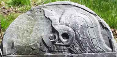 Winged Death's Head on Headstone of James Meritt (1713).